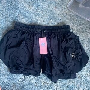 Athletic shorts flowy skirt look